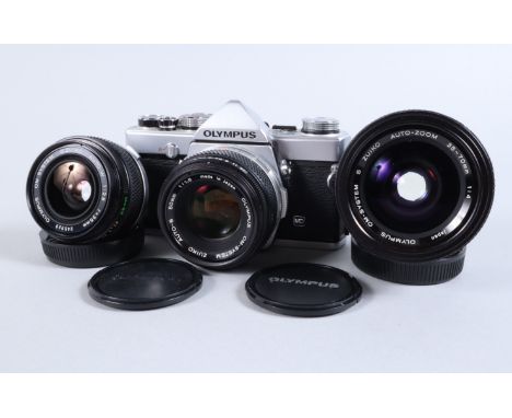 An Olympus OM 1 MD SLR Camera, chrome, serial no 1927342, shutter working, meter responsive, self timer working, body G-VG, s