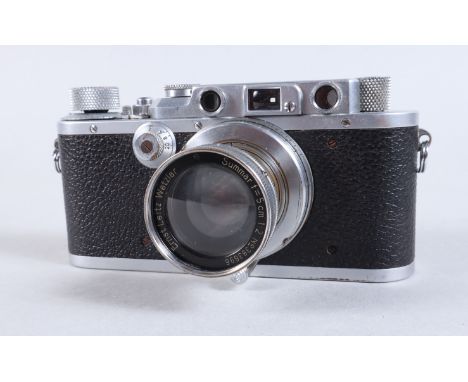 A Leitz Wetzlar Leica IIIa Camera, serial no 257051, 1937, shutter working, viewfinder clear, rangfinder working, body G, som