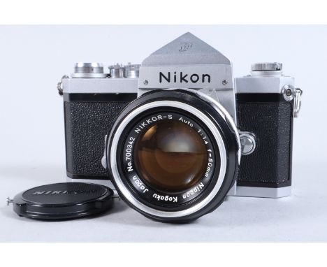 A Nikon F SLR Camera, chrome, serial no 6583069, prism viewfinder, shutter working, self timer working, body G, slight scratc