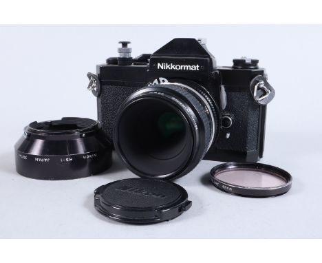 A Nikon Nikkormat FT2 SLR Camera, black, serial no 5182828, shutter sticking on one and one half second, otherwise ok, meter 