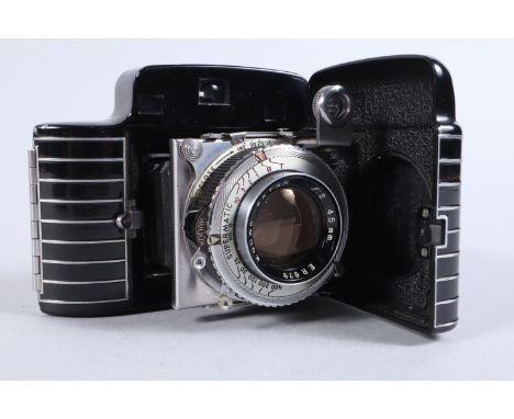 A Kodak Bantam Special Rangefinder Camera, shutter working, viewfinder clear, rangefinder working, body G, some light scratch