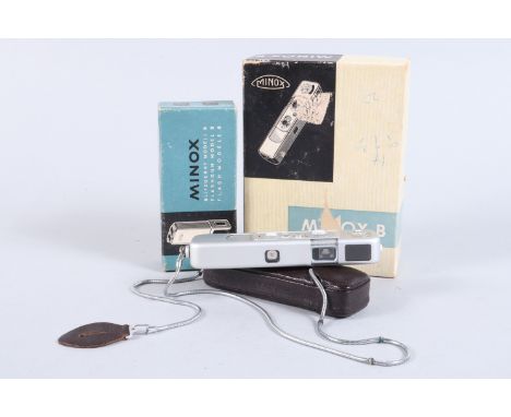 A Minox B Sub Miniature Camera, shutter working, meter responsive, body G, some finger marks on rubber, with leather case, ca