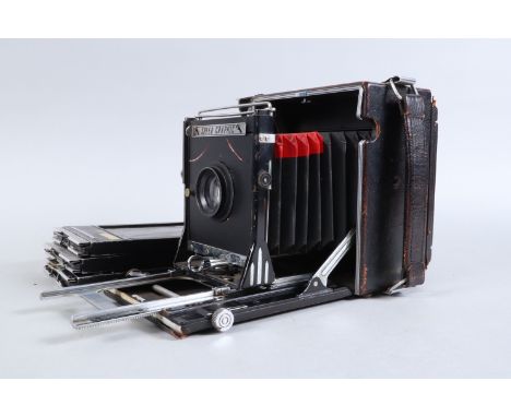 A Graflex Anniversary Speed Graphic Press Camera, black trim, 5 x 4in format, body P, heavy use, bellows repaired, shutter wo