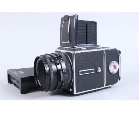 A Hasselblad 501 CM Camera,  serial no 10EU11277, shutter working, body VG, with Carl Zeiss T* C 80mm f/2.8 Planar lens, seri