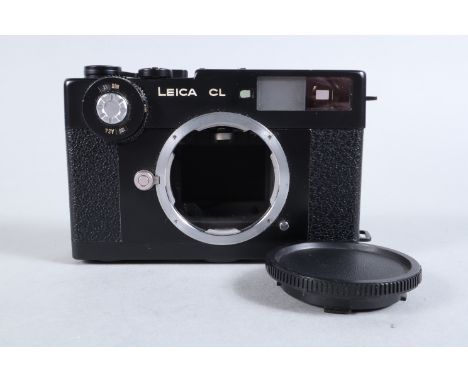 A Leica CL Camera body, black, Leitz Wetzlar, serial no 1406323, 1974-75, shutter working, viewfinder clear, body G, light we