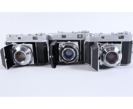 Three Kodak Retina Folding Rangefinder Cameras comprising a Retina IIc camera, serial no 587909, body G, Synchro-Compur shutt