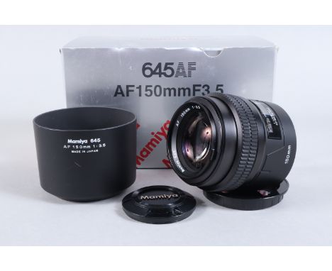 A Mamiya 645 AF 150mm f/3.5 lens, serial no CE1097, AF functions, barrel VG, elements VG-E, with caps, manual, in maker's box