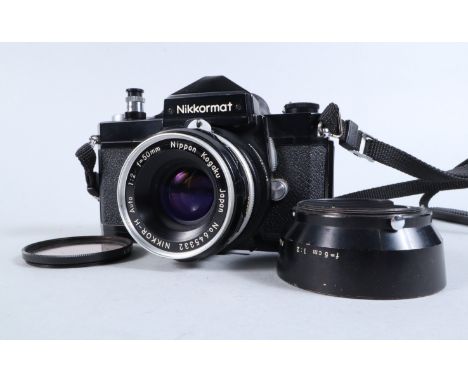 A Black Nikkormat FTN SLR Camera,  serial no 4477172, body F-G, a  postcode faintly twice on baseplate, shutter working, mete