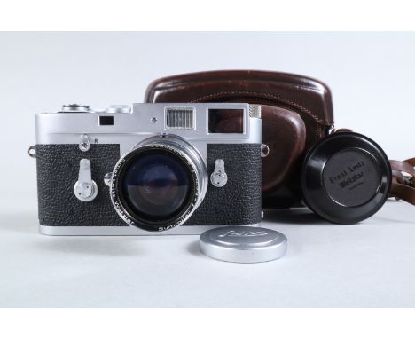 A Leica M2 Camera, chrome, serial no 1085 642, 1961, self timer model, shutter working, self timer working, viewfinder clear,