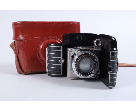 A Kodak Bantam Special Rangefinder Camera, shutter working, viewfinder clear, rangefinder working, body G, some laquer wear t