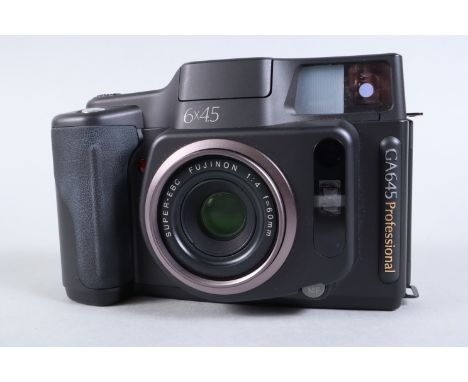 A Fuji GA645 Professional Camera, 6 x 4.5, serial no 6080597, powers up, LED display functions, auto focus functions, shutter