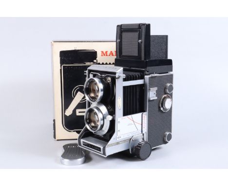 A Mamiya C33 Professional TLR Camera, interchangeable lens 6 x 6cm TLR, 120 film back, waist level viewing hood, body G-VG, d