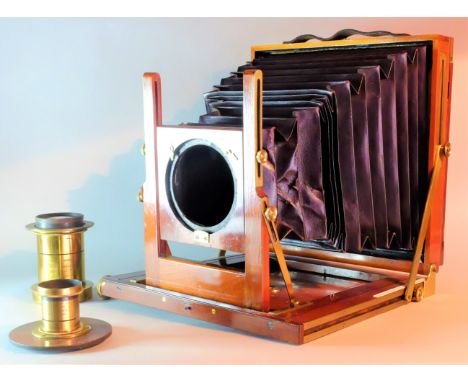 A late 19th Century W H Humphries &amp; Co mahogany and brass 10in x 8in Field Camera,  with rising front, maker's plate 'W H