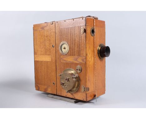 An Ernemann Normal Kino Model A 35mm Motion Picture Camera, serial no 940118, 1908-18, wood body, hand-cranked field camera, 