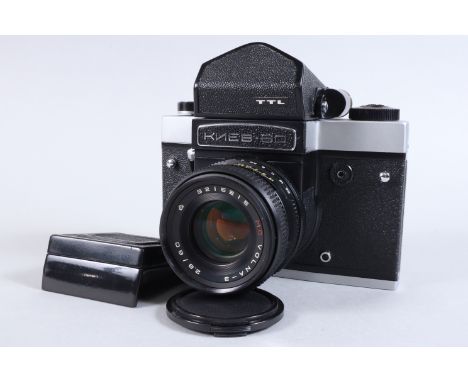 A Kiev 60 TTL Camera, chrome, serial no 9209962, shutter working, with metered prism viewfinder, meter responsive, body VG, w