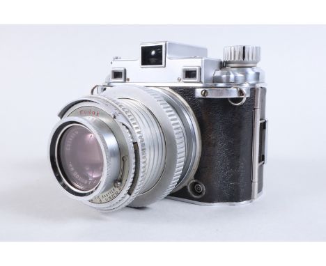 A Kodak Medallist II Camera, serial no 40557, shutter sluggish on slow speeds, shutter button slow to return, rangefinder fun