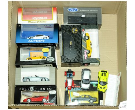 Kyosho, Minichamps, Auto Art, Herpa and similar a boxed group to include Kyosho 03151R Caterham Super Seven (Red), Auto Art 5