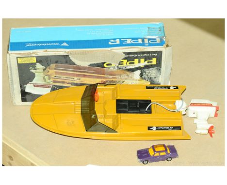 Monteleone (Italy) 656 "Piper" Speedboat - battery-operated plastic model is light tan in colour, with electric outboard moto