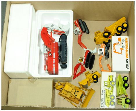 Conrad a mainly unboxed group to include 2762 Terex Articulated Dump Truck, Atlas Weyhausen Mobile Excavator, unboxed O&amp;K