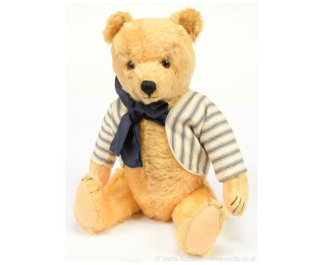 Vintage teddy bear, in the style of a German Teddy Original bear, golden mohair, brown and black glass eyes, black vertically