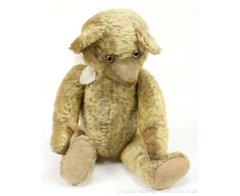 Early British vintage blonde mohair teddy bear, clear glass eyes (glued into position), with black pupils and remains of brow