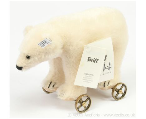 Steiff Polar bear on wheels 1911 replica, white tag 673184, LE 36/5000, replica metallic Steiff button, available at demonstr