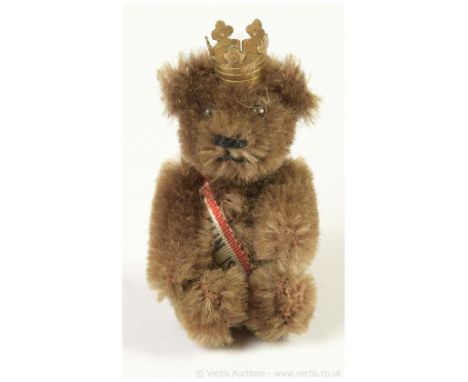 Schuco Berlin miniature teddy bear brooch, 1950s, chocolate brown mohair, black metal bead eyes, black stitched nose and mout