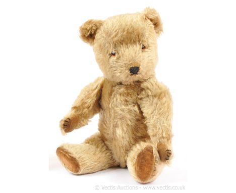 Chiltern Hug-Mee vintage teddy bear, British, 1950s, golden mohair with black fleck, amber and black glass eyes, vertically s