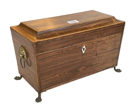 Victorian inlaid rosewood tea caddy on brass claw feet, 20cm high.