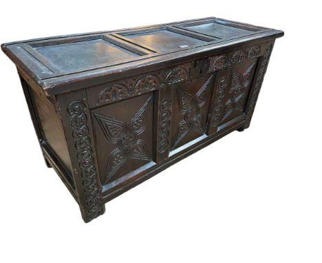 Antique oak triple carved panel front coffer, 55.5cm by 110cm by 45cm.