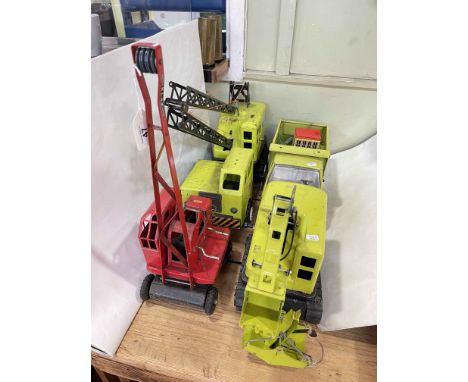 Collection of vintage toy vehicles including Triang, Tonka, etc.