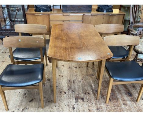 Vintage teak six piece dining suite comprising Long John sideboard, drop leaf table and four chairs.