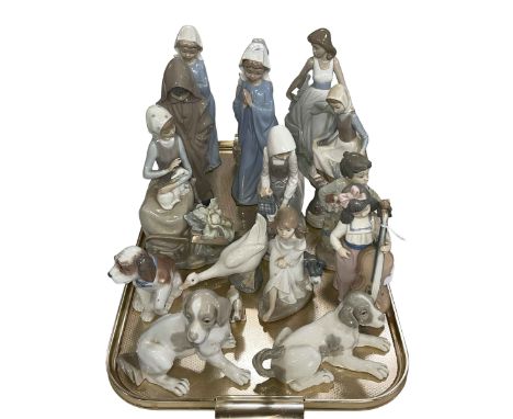 Two Lladro figures, Nao figures and animals and Nadal dog.