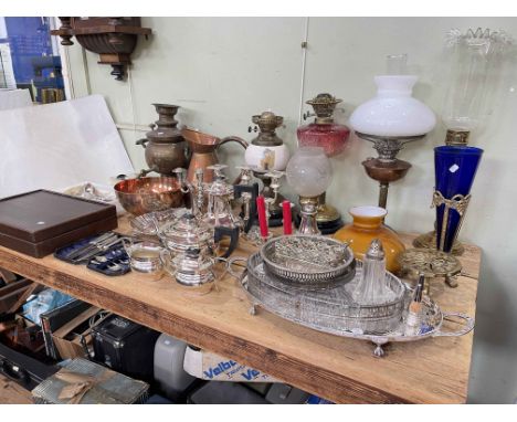Collection of Victorian oil lamps including ruby glass reservoir, brass columned, hand painted, clear shades, etc, together w