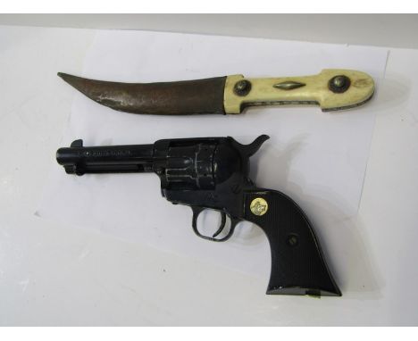 WEAPONS, Eastern carved bone handled dagger with sheath; together with replica pistol - Single Action Army .45 