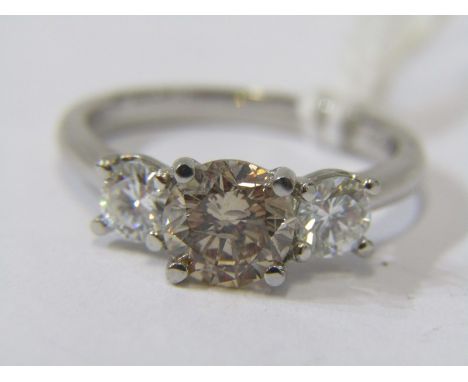 PLATINUM 3 STONE DIAMOND RING, principal champagne diamond, beautiful warm colour with masses of fire, set between pair of wh