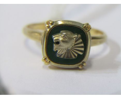 GOLD &amp; ENAMEL RING, yellow gold ring (tests high carat) with a lions head on a green enamel base 5 grams 