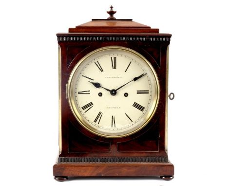 A Regency bracket clock, S & W Shoreman, with painted Arabic dial and eight-day striking movement, in caddy topped mahogany c