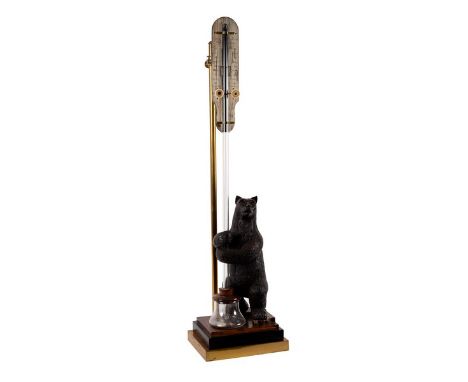 A mid 19th Century barometer by Robert Gogerty, 72 Fleet Street, London, the barometer glass with carved oak dancing bear sup