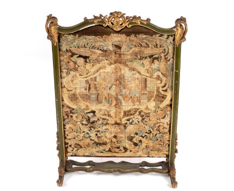 An Italian green painted and parcel-gilt fire screen, 18th Century, the contemporary needlework panel with a figure vignette 