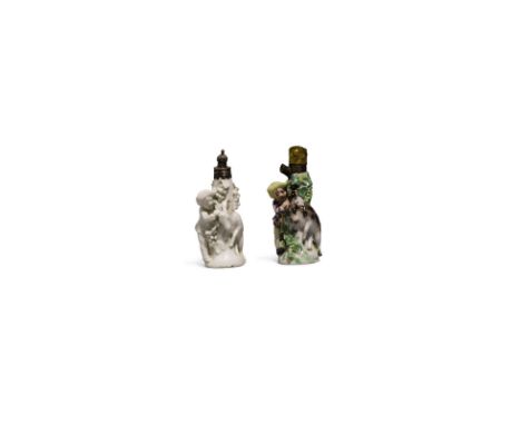 A late 18th Century German porcelain scent bottle, perhaps Kloster Veilsdorf, modelled as a boy and kid around a vine hung tr