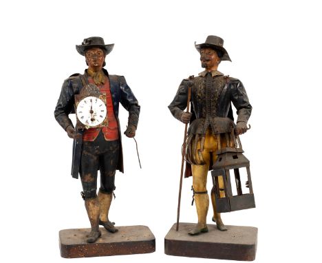 A Black Forest travelling clockmaker's clock, with a distressed timepiece movement, the painted figure dressed in a broad bri