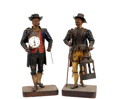 A Black Forest travelling clockmaker's clock, with a distressed timepiece movement, the painted figure dressed in a broad bri