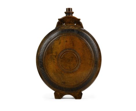 An early 19th Century wooden water flask of large proportions, 43cm high/Note: a smaller flask described as probably Scottish