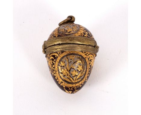 A late 19th Century hinged enamel pendant egg, probably Viennese, the body enamelled in deep magenta and painted with gold sw