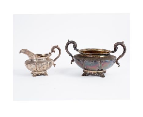 A Victorian silver milk jug and sugar basin, Bateman & Ball, London 1840, of fluted melon shape, engraved with formal leafage