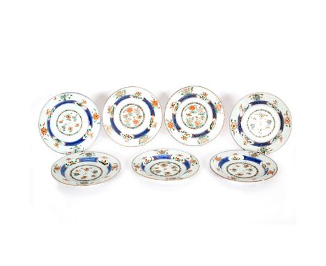 Seven Chinese famille verte plates, Kangxi, with a central medallion of mandarin ducks among water plants within a cavetto of