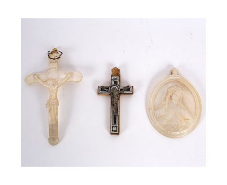 A group of St. Sulpice-ware, Jerusalem, late 19th century, comprising two mother of pearl pendants and a silver, mother of pe