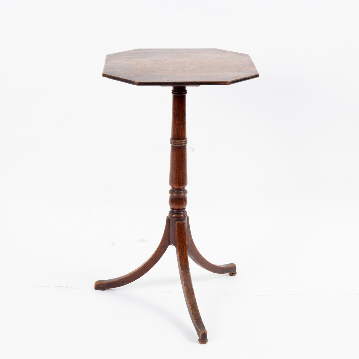 A Regency mahogany octagonal occasional table, on a turned stem and ...