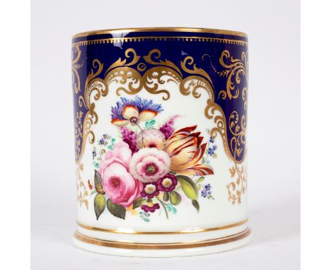 A Grainger's Worcester porcelain mug, circa 1820, painted with a bouquet of flowers flanked by gilt initials, JD below an ela